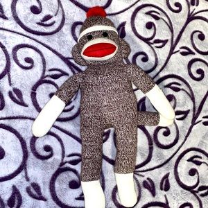 Sock Monkey small tear in arm